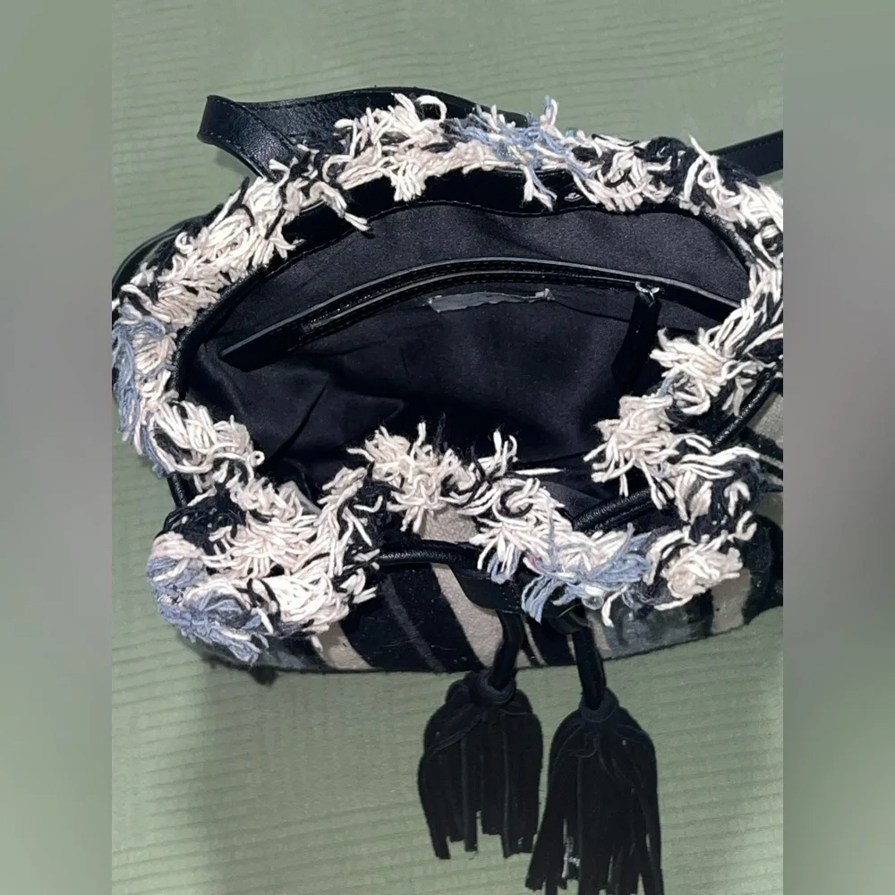 Lucky Brand Alzon Drawstring Clinched Fringed Backpack Blue, Black and Cream